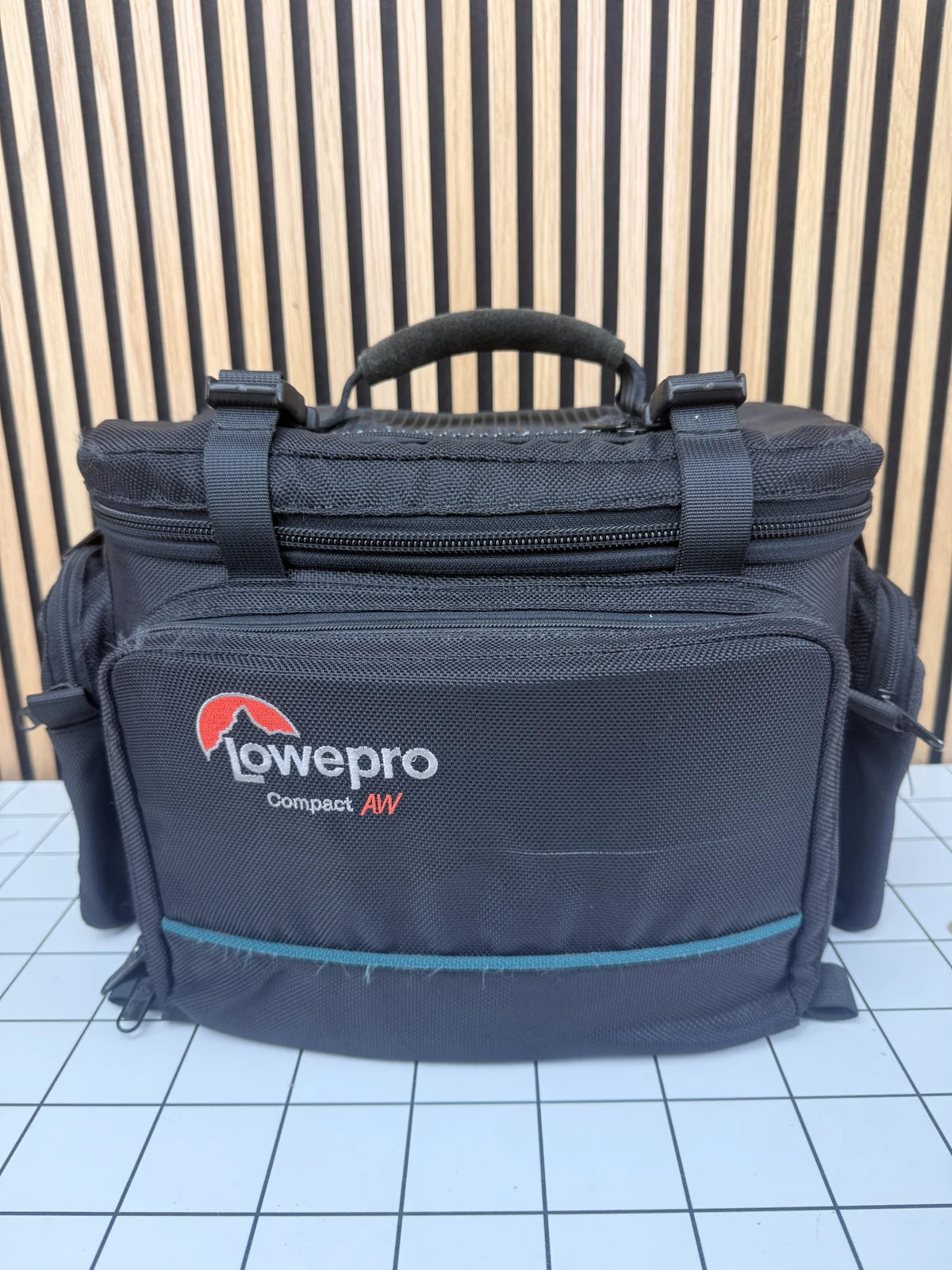 compact AW camera tas